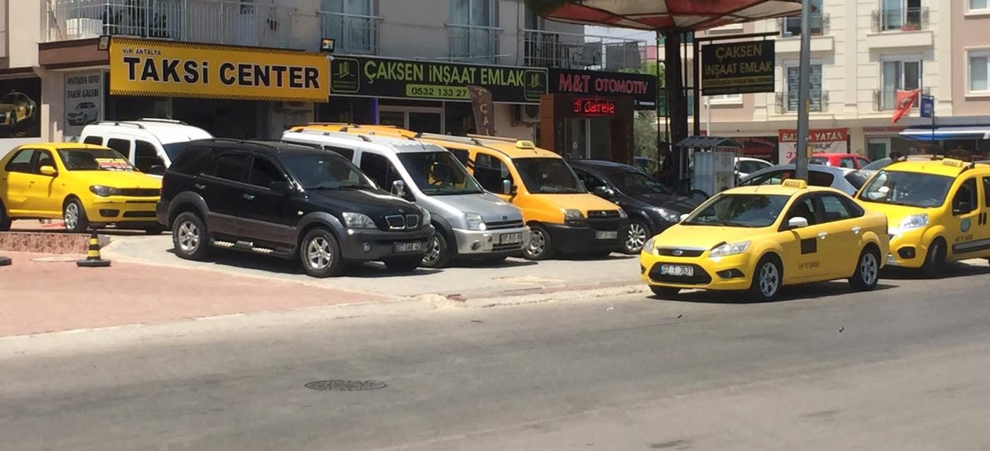Antalya Taksi Center eski mağaza vitrini ve araçlar
